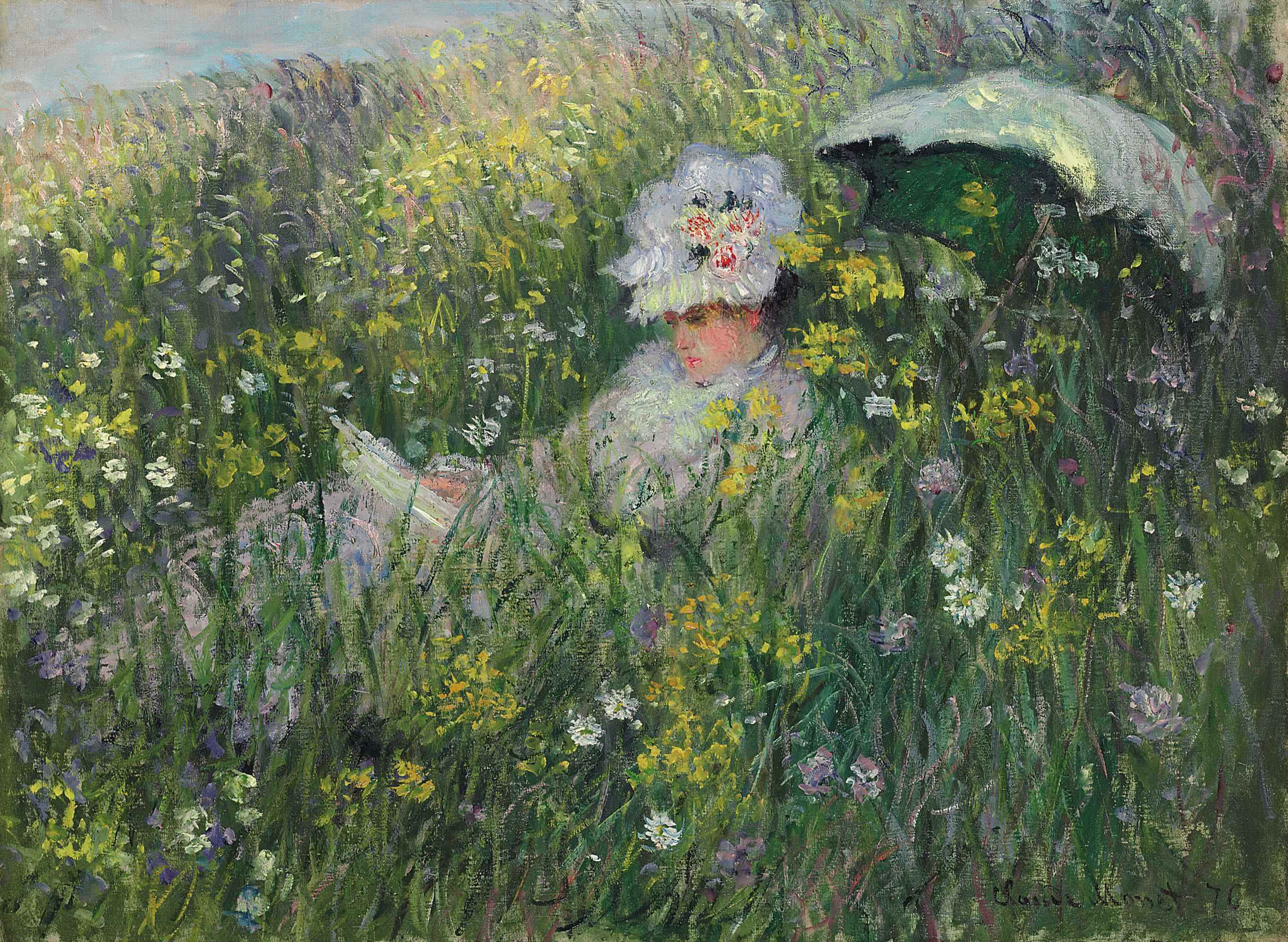 A woman in a flowered white hat reads in tall green grass full of yellow and white flowers, a green parasol tilted behind her — Claude Monet, In the Meadow (Dans la prairie), 1876