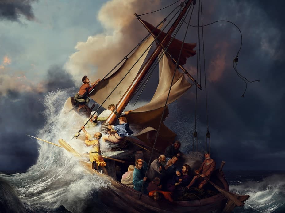 A fishing boat with a torn sail heels over on a towering wave as men cling to the rigging and others crowd around Christ in the stern — Rembrandt, The Storm on the Sea of Galilee, 1633