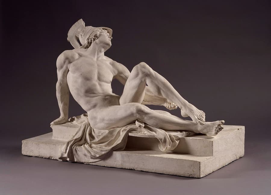 A nude warrior in a crested helmet reclines on a stepped base, head thrown back, reaching toward his wounded heel — Jean-Baptiste Giraud, Dying Achilles, c. 1788–89