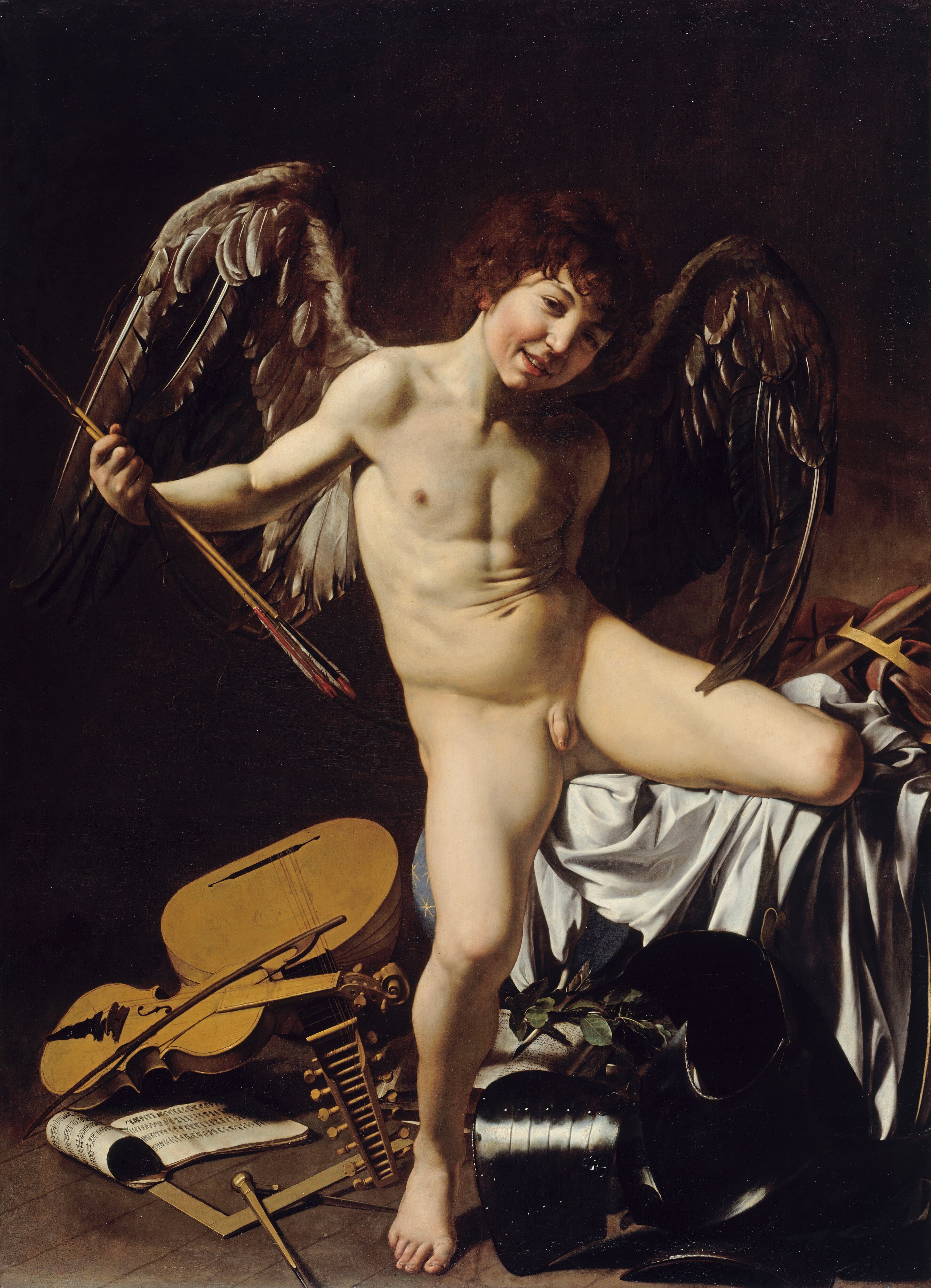 A naked, grinning winged boy holding arrows climbs over a table above a scattered violin, lute, armor, crown and globe — Caravaggio, Amor Vincit Omnia, 1601–02