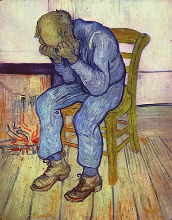 An old man in a blue suit sits hunched on a wooden chair by a small fire, fists pressed to his eyes — Vincent van Gogh, At Eternity's Gate, 1890