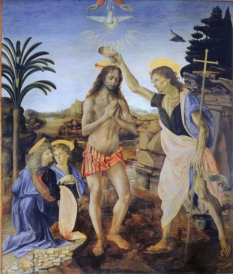 John the Baptist pours water over the head of Christ standing in a river, as two angels kneel at left and a dove descends from above — Andrea del Verrocchio and Leonardo da Vinci, The Baptism of Christ, c. 1470–75