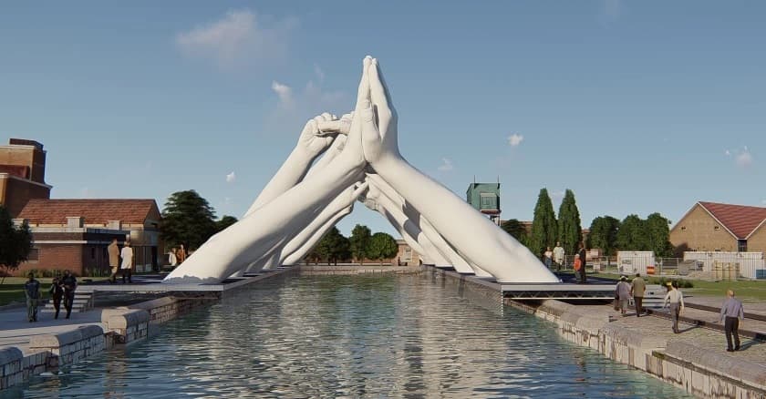 Pairs of giant white hands rise from both banks of a straight canal and meet overhead, fingers interlocked and palms pressed together — Lorenzo Quinn, Building Bridges, Venice, 2019
