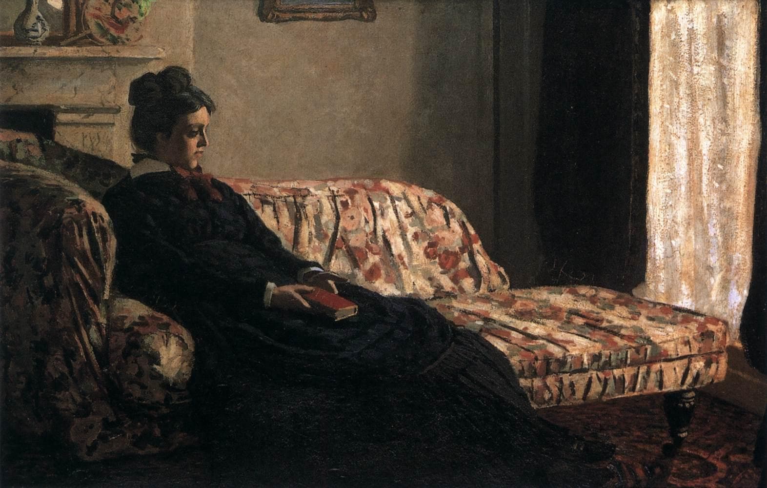A woman in a dark dress sits on a flowered chintz sofa holding a red book, light filtering through a curtained window — Claude Monet, Meditation, Madame Monet on the Sofa, c. 1871