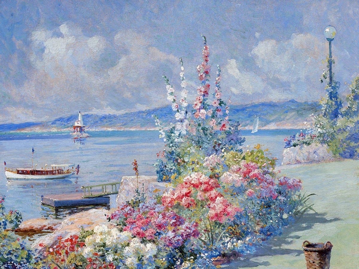A seaside border of pink and white hollyhocks and phlox runs along a lawn above a blue harbor with a motor launch, a lighthouse and sailboats — Abbott Fuller Graves, Garden House, Gloucester