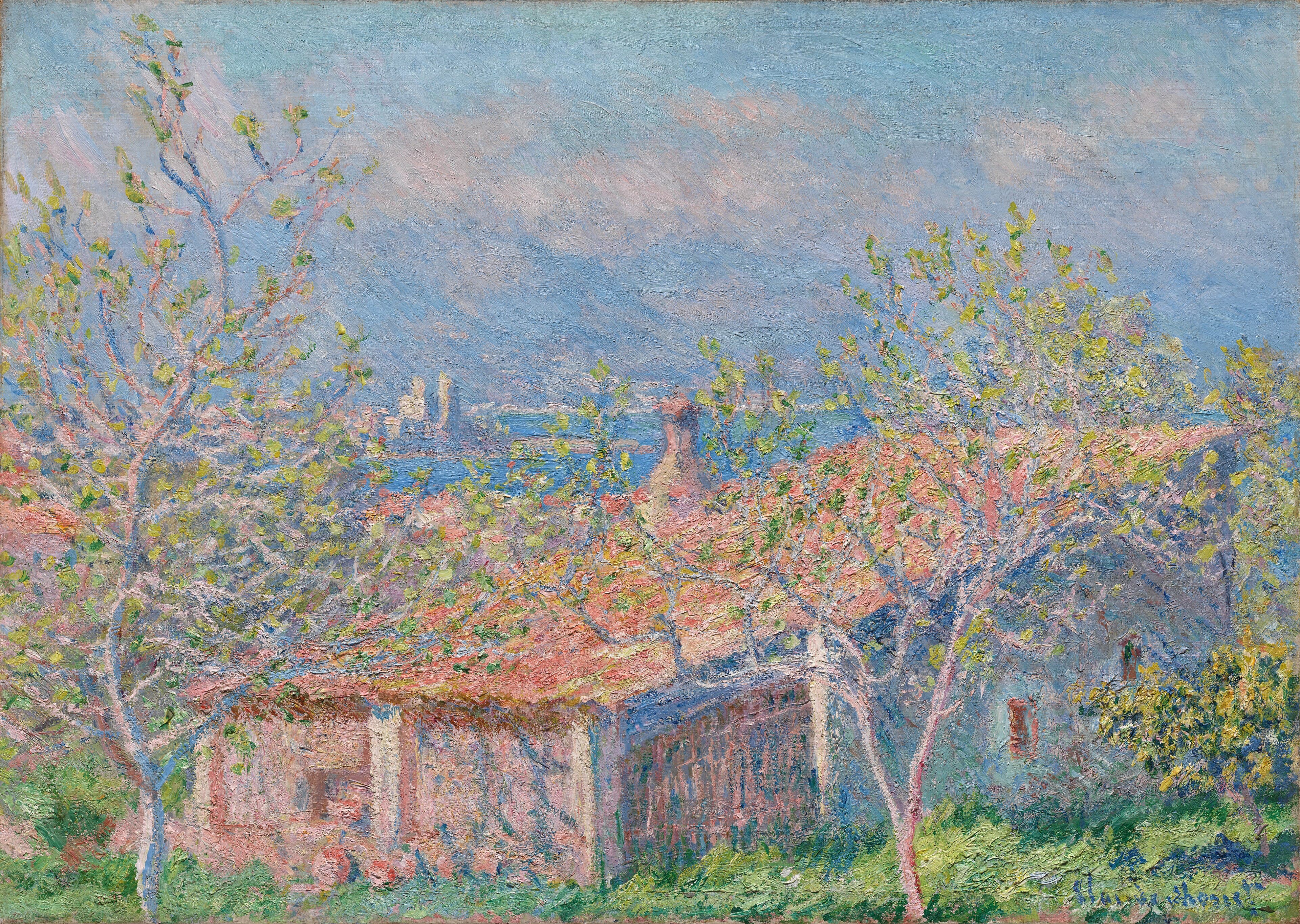 A low cottage with a coral tiled roof is seen through slender trees in new leaf, with a blue sea and two distant towers beyond — Claude Monet, Gardener's House at Antibes, 1888