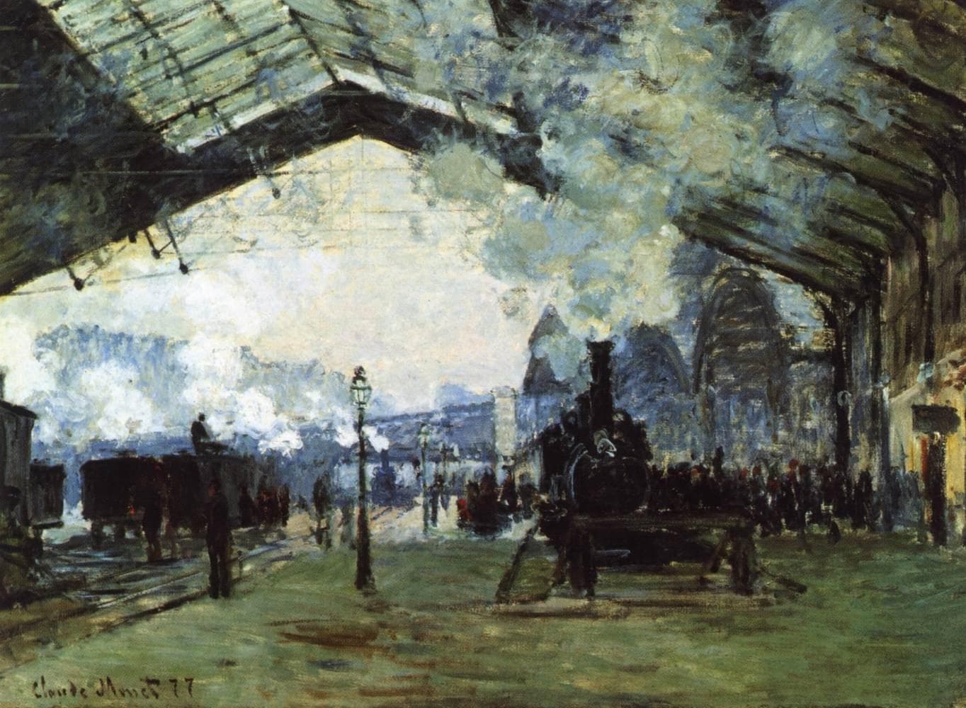 A black locomotive arrives under a dark iron-and-glass station roof as white and blue steam billows upward, with a crowd on the platform and a gas lamp in front — Claude Monet, Gare Saint-Lazare: the Train from Normandy, 1877