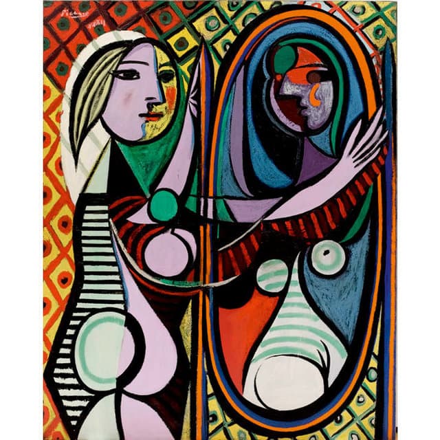 A woman with a double lilac-and-yellow face reaches toward a tall oval mirror holding a darker, distorted reflection, against diamond-patterned wallpaper — Pablo Picasso, Girl before a Mirror, 1932