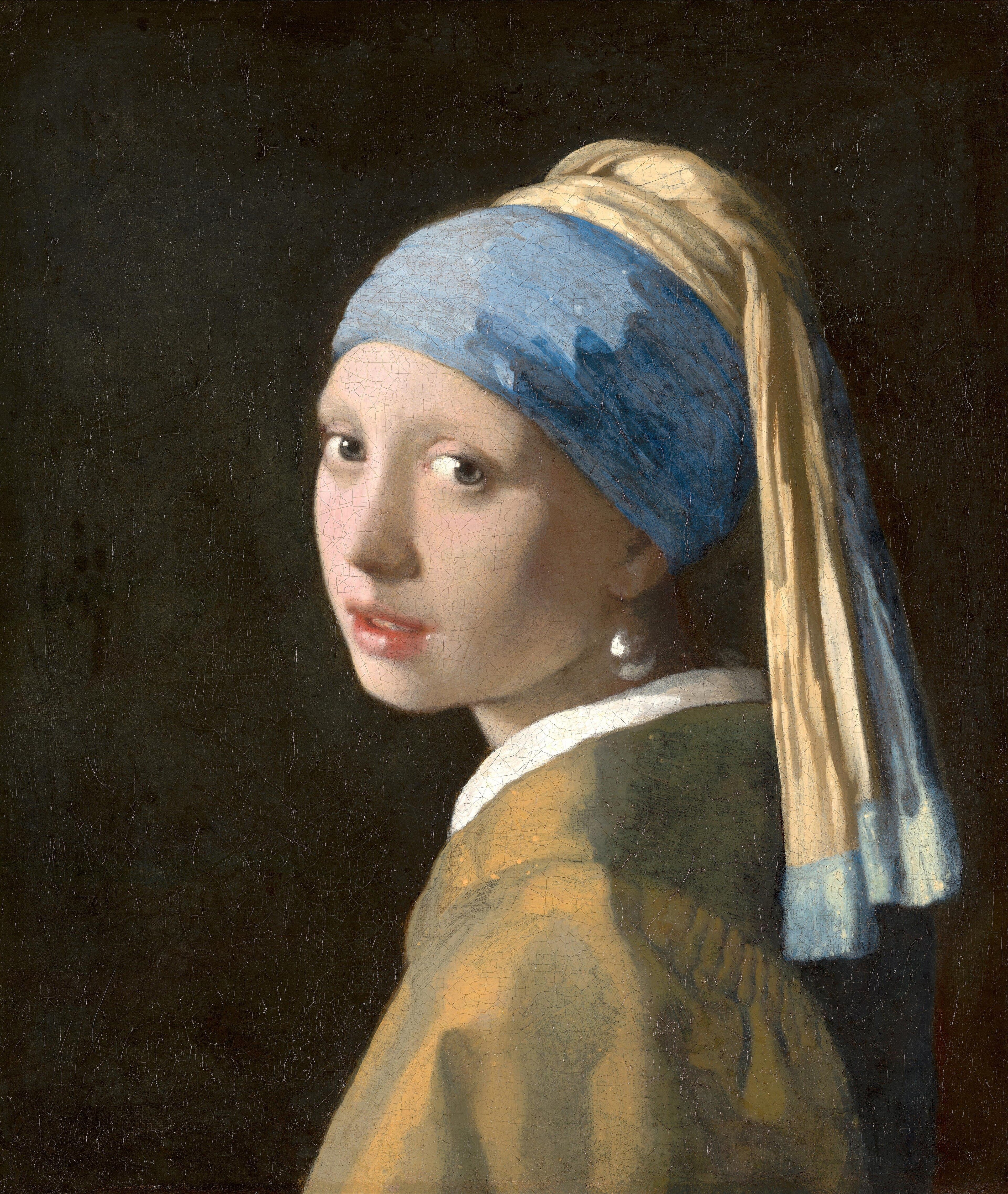 A young woman in a blue and yellow turban glances over her shoulder with parted lips, a large pearl glowing at her ear — Johannes Vermeer, Girl with a Pearl Earring, c. 1665