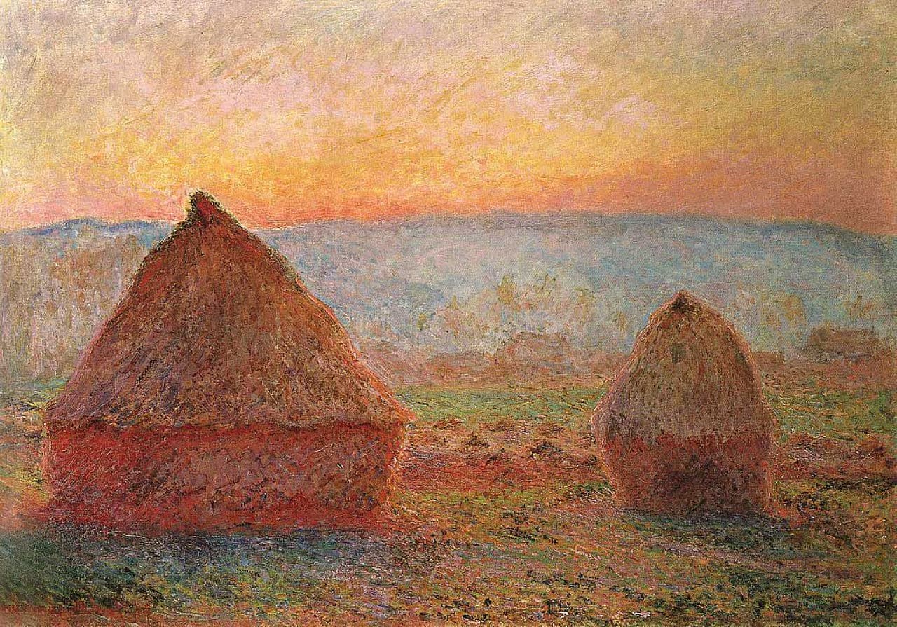 Two grainstacks glow red and orange against a blazing orange and pink sunset sky, blue hills behind — Claude Monet, Grainstacks at Giverny, the Evening Sun, 1888–89