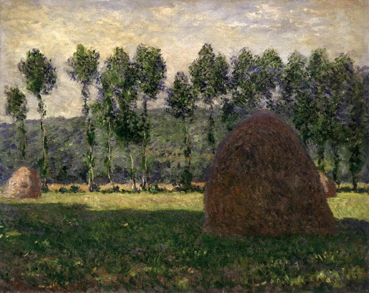 A large russet wheat stack and smaller stacks in a cloud-shaded meadow before a row of tall poplars and a wooded hillside under a pale sky — Claude Monet, Haystack near Giverny, 1884–89
