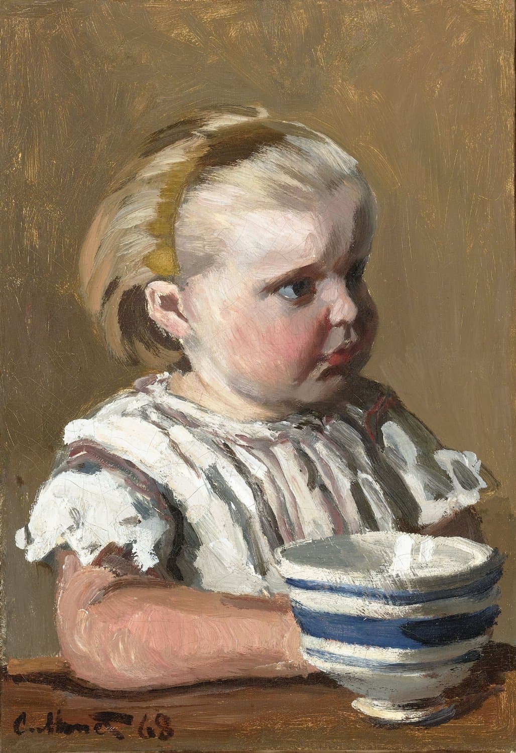 A fair-haired toddler in a striped white smock sits at a table beside a blue-striped bowl, looking to the right — Claude Monet, L'Enfant à la tasse, 1868