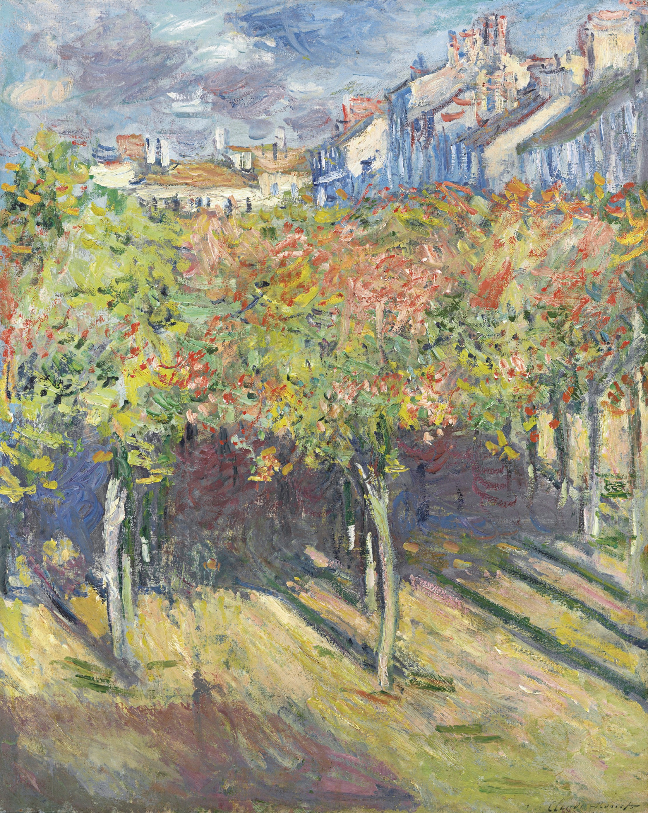 A row of lime trees in green, yellow and red foliage casts long violet shadows across a sunlit path, with town rooftops beyond — Claude Monet, Les Tilleuls à Poissy, 1882