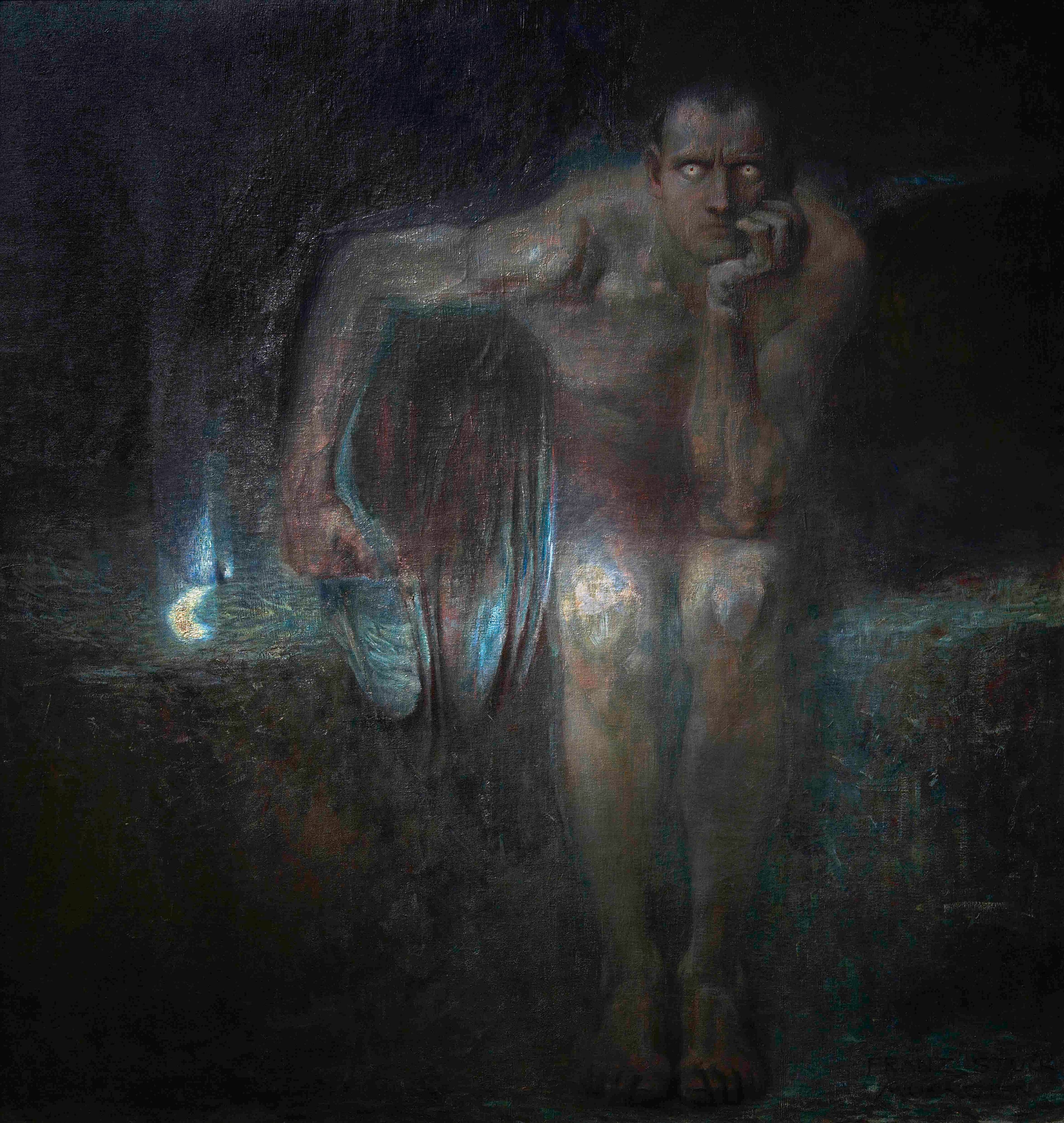 A dark naked winged figure crouches on a rock with his chin in his hand, his pale glowing eyes staring out of the shadows — Franz von Stuck, Lucifer, 1890