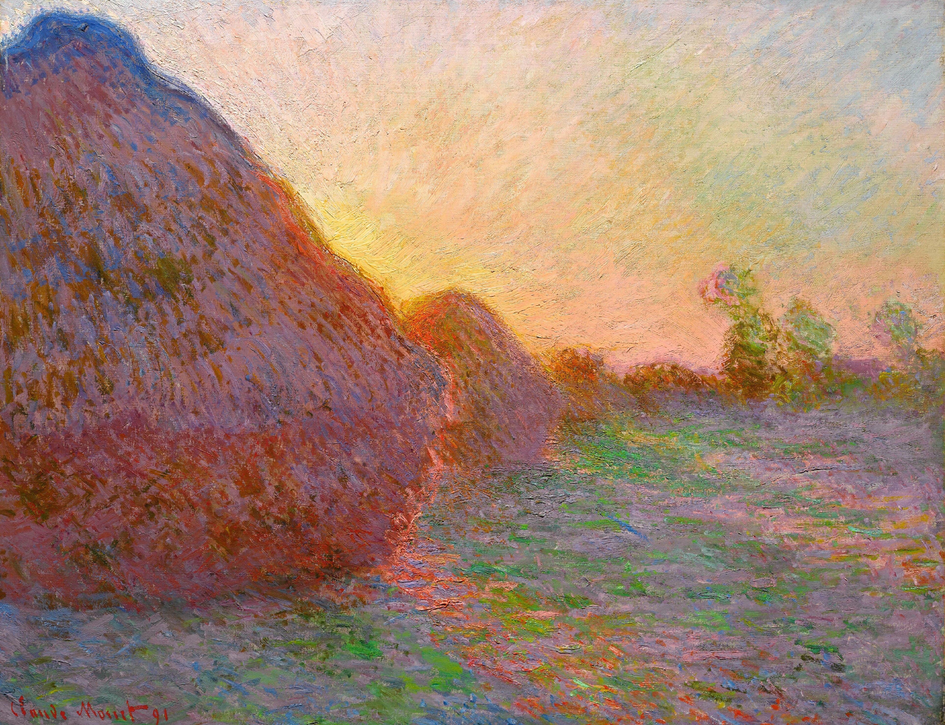 A huge grainstack in red and violet shadow fills the left side, a second stack edged in gold behind it, against a glowing yellow and pink sky — Claude Monet, Meules (Grainstacks), 1890