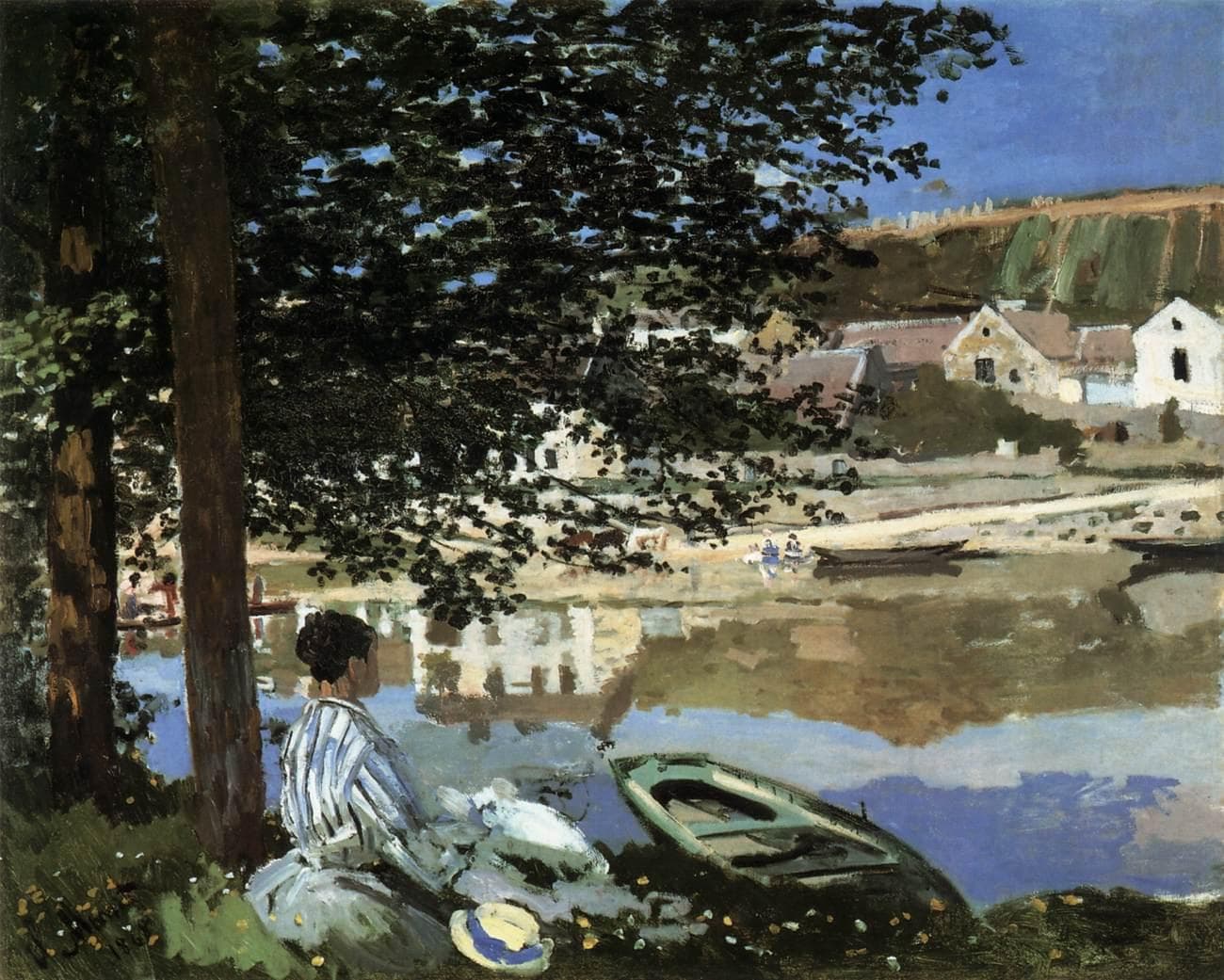 A woman in a blue-and-white striped dress sits under a tree beside a green rowing boat, looking across the river at a village and its reflection — Claude Monet, On the Bank of the Seine, Bennecourt, 1868