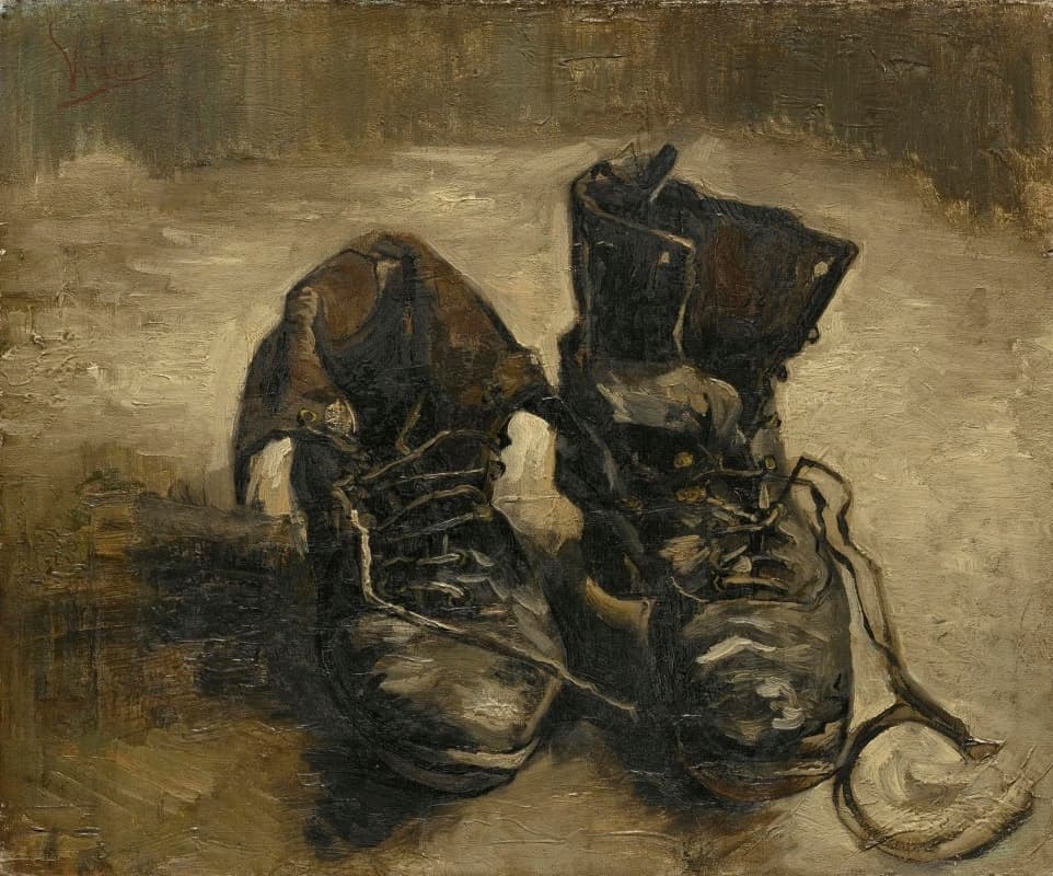 A pair of battered leather work boots with loose laces on a bare floor, one collapsed, painted in dark browns — Vincent van Gogh, Shoes, 1886