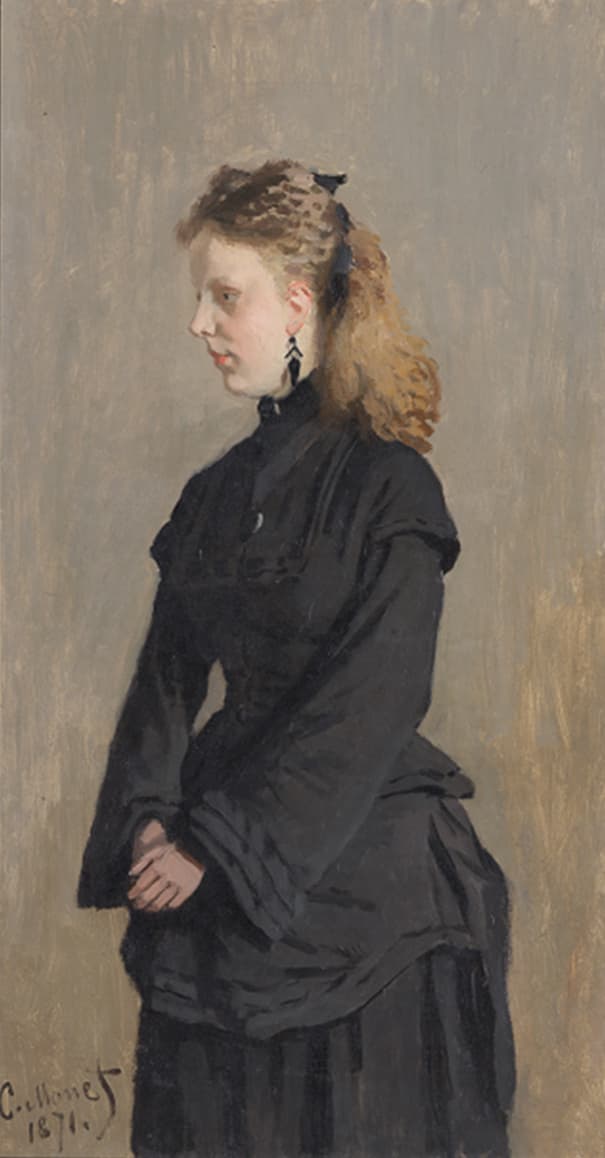 A young woman with long reddish-blond curls stands in profile in a black dress with wide sleeves and drop earrings against a plain gray background — Claude Monet, Portrait of Guurtje van de Stadt, 1871