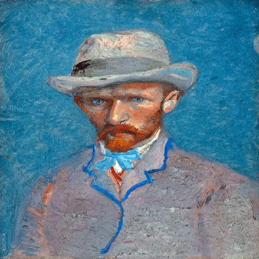 A red-bearded man in a grey felt hat, lilac jacket outlined in cobalt and a pale blue bow tie looks out against a vivid blue background — Vincent van Gogh, Self-Portrait with Grey Felt Hat (or Portrait of Theo van Gogh), 1887