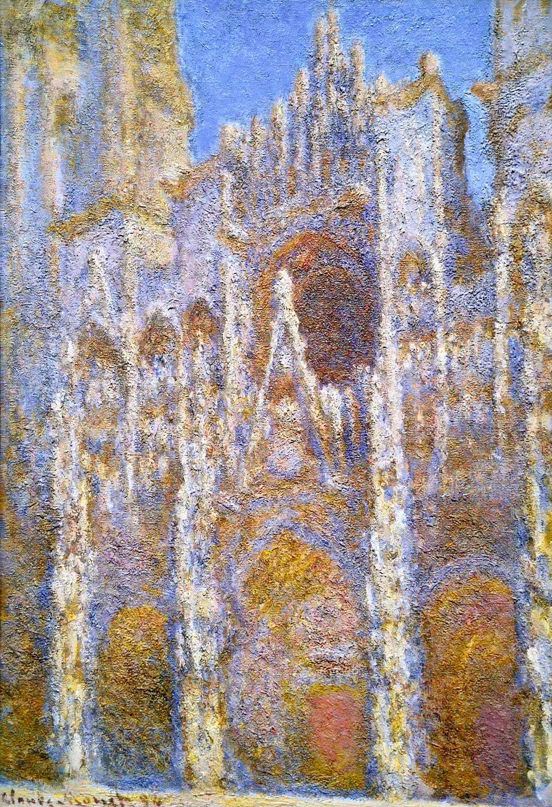 The Gothic portal of Rouen Cathedral seen head on in bright sun, gold and ocher stone striped with lilac shadow under a clear blue sky — Claude Monet, Rouen Cathedral, Façade, 1893–94