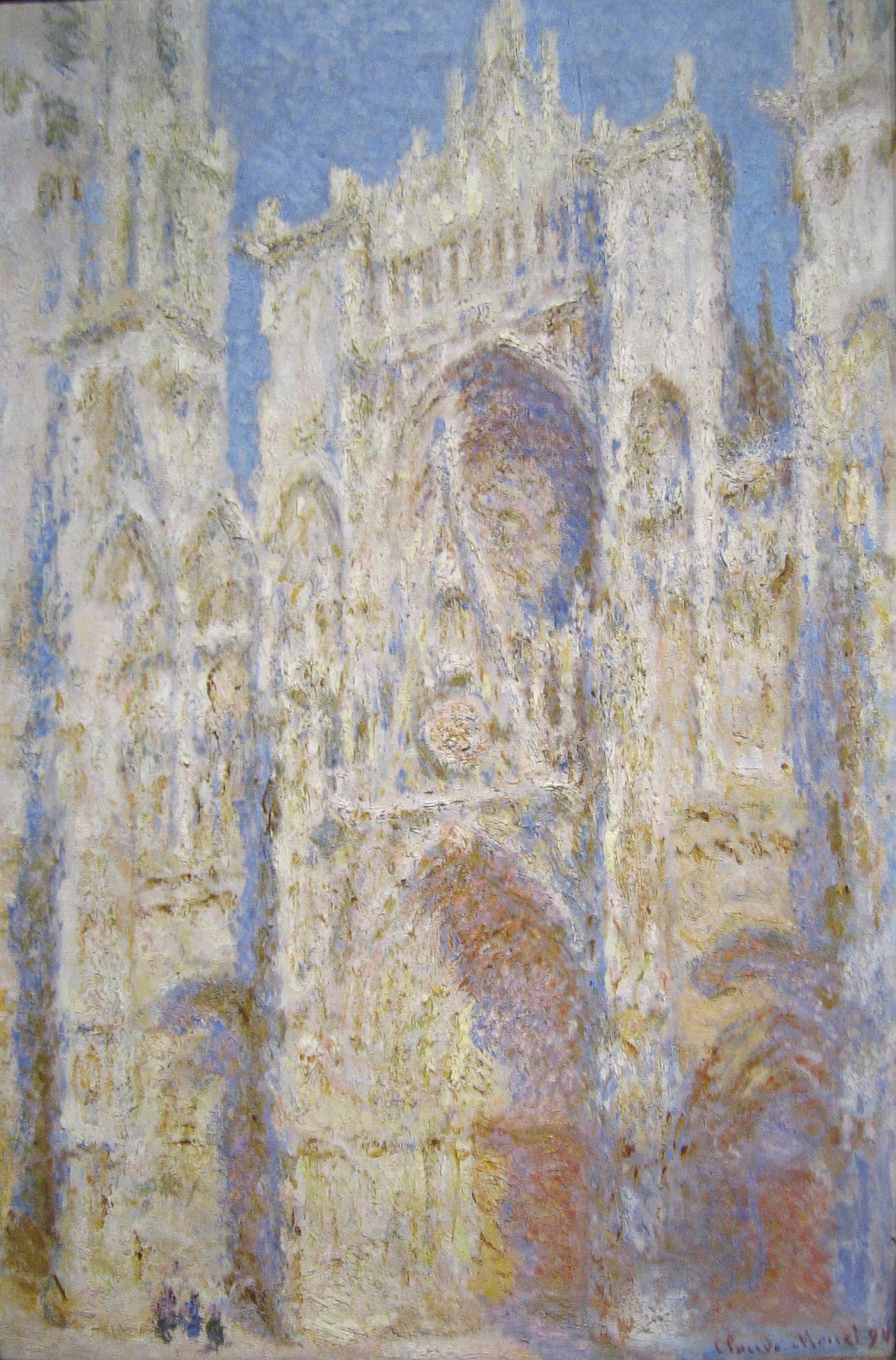 The Gothic façade of Rouen Cathedral glows almost white in full sun with pale blue shadows under a blue sky, three tiny figures at the lower left — Claude Monet, Rouen Cathedral, West Façade, Sunlight, 1892–94