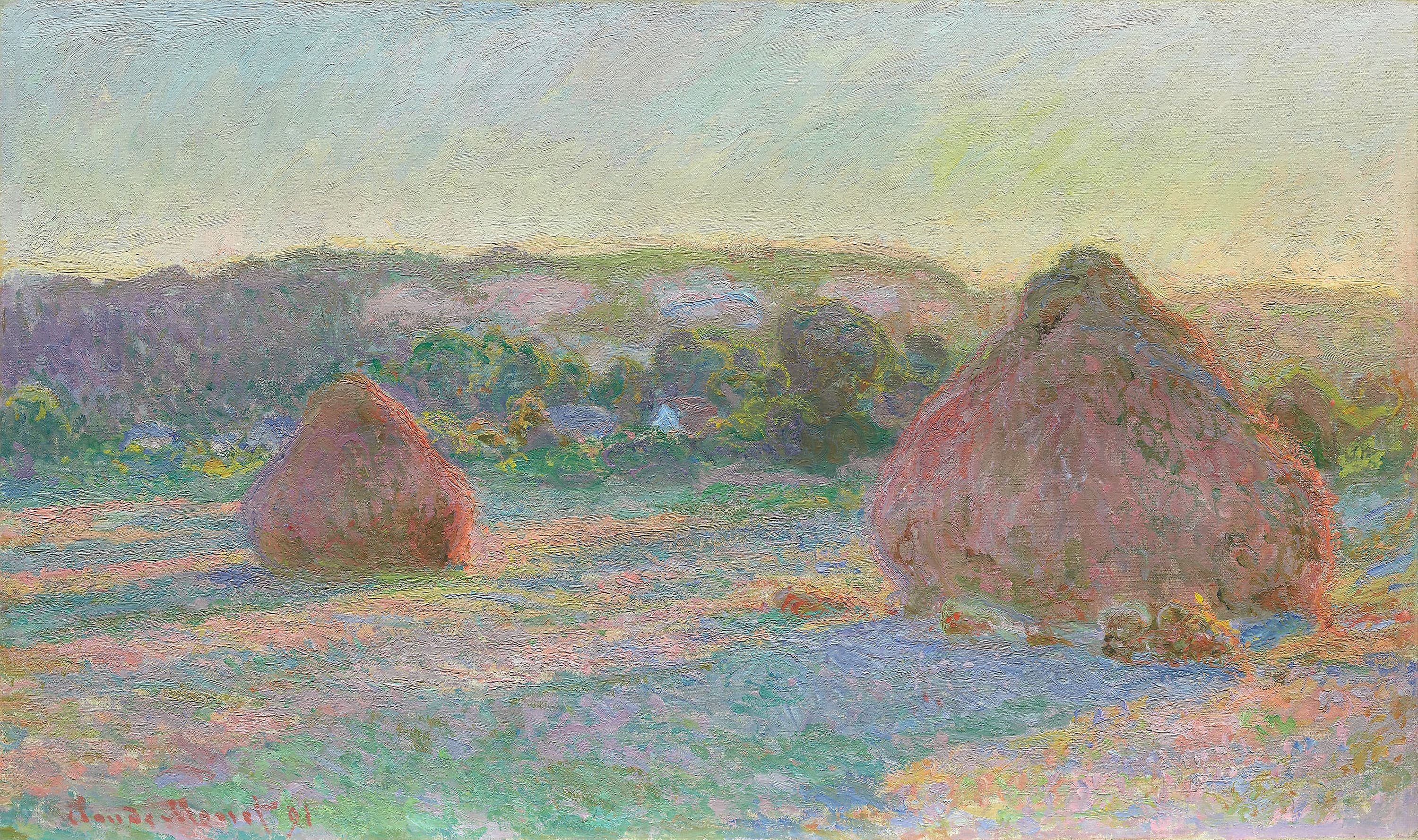 Two rose and rust wheat stacks cast long blue shadows over pink stubble, houses and a wooded ridge beyond under a yellow-green sky — Claude Monet, Stacks of Wheat (End of Summer), 1890–91