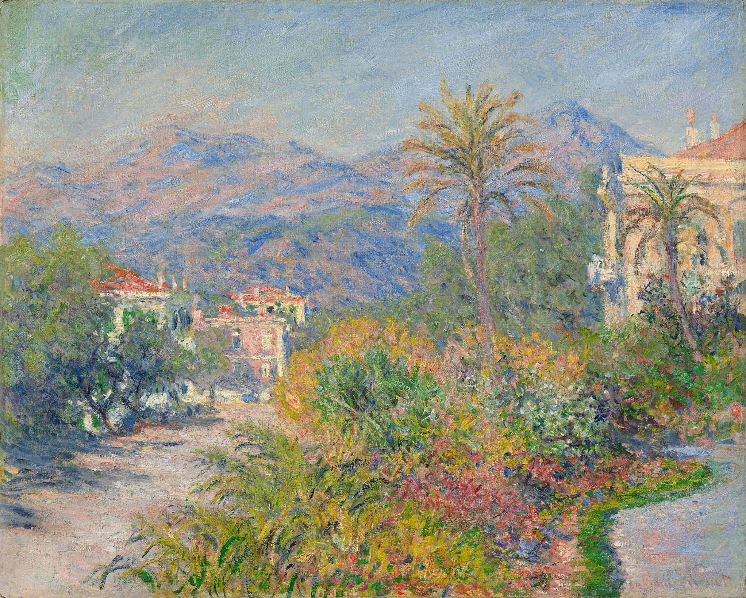 A pale road curves past flowering shrubs and a tall palm toward villas half hidden in greenery, with pink and blue mountains behind — Claude Monet, Strada Romana in Bordighera, 1884