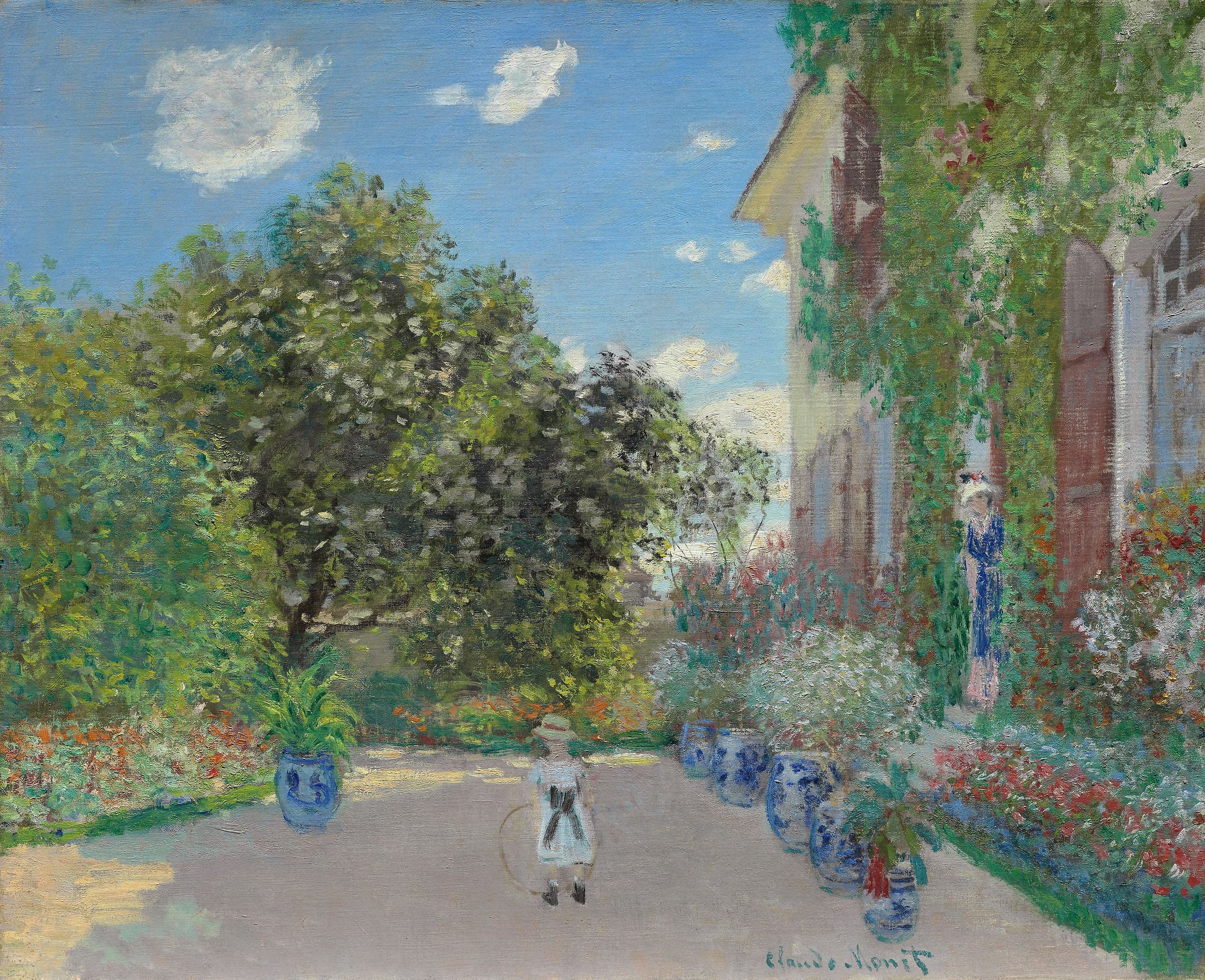 A sunny garden path before a vine-covered house with blue-and-white flower pots, a small boy with a hoop and a woman in the doorway — Claude Monet, The Artist's House at Argenteuil, 1873