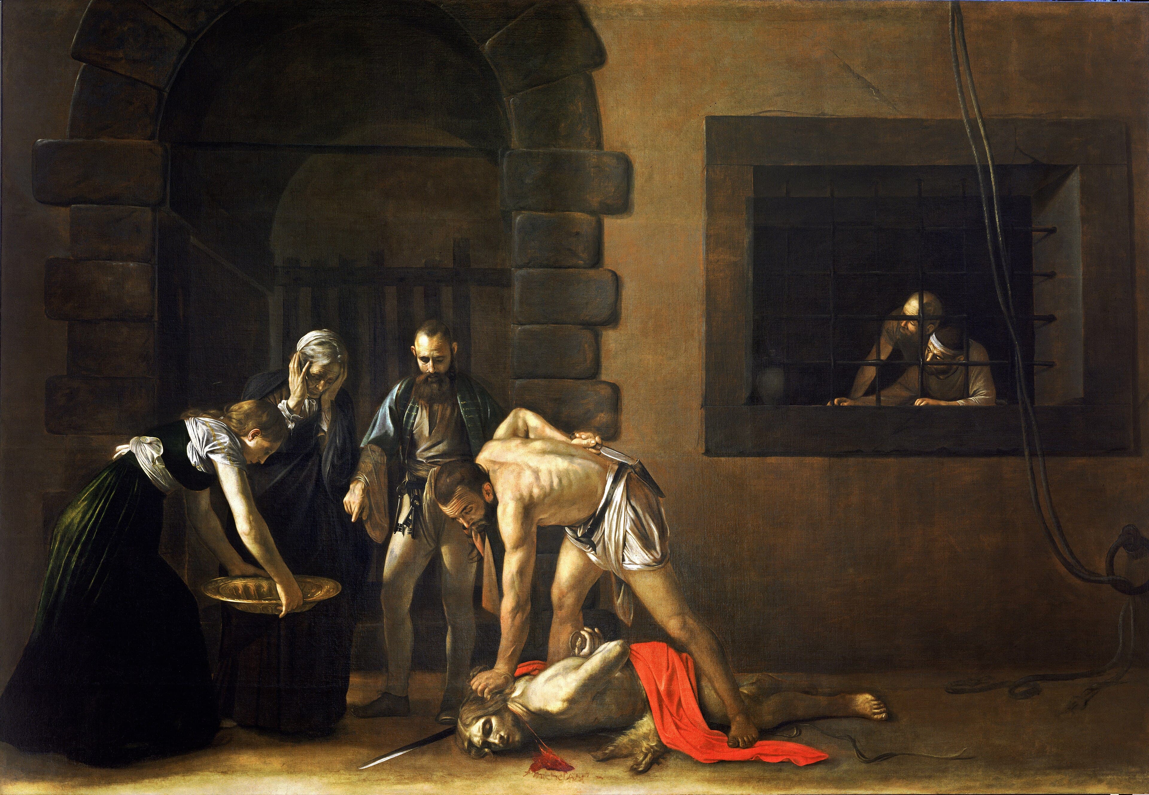 In a shadowed prison courtyard an executioner pins down the bleeding saint as a girl holds out a golden platter and prisoners watch through bars — Caravaggio, The Beheading of Saint John the Baptist, 1608