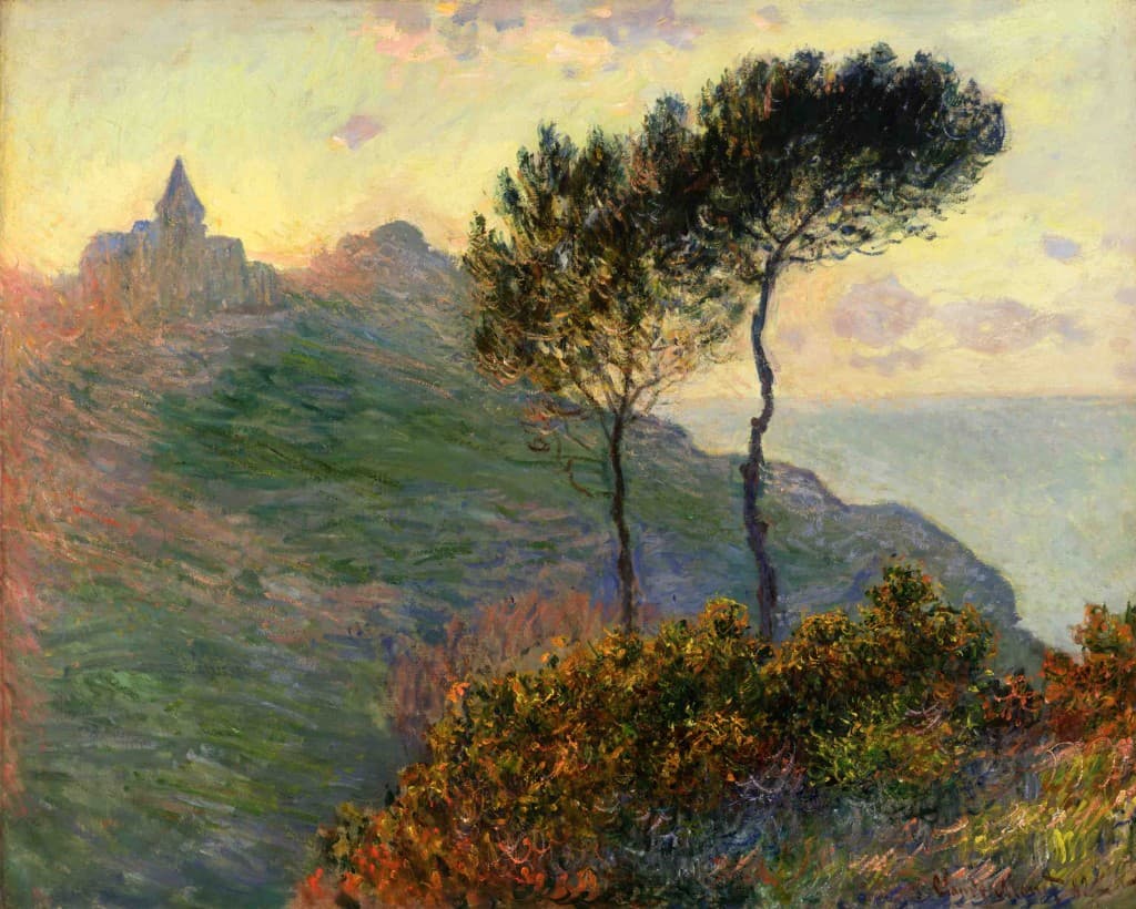 A clifftop church stands in dark silhouette against a pale yellow sunset, with two slender pines and glowing orange scrub on the slope below — Claude Monet, The Church at Varengeville, 1882