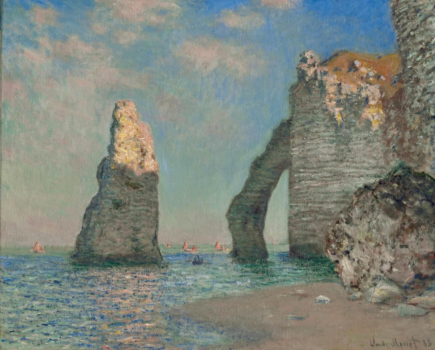 A tall chalk needle and a cliff arch glow gold at their tops above a calm blue-green sea with small red sails — Claude Monet, The Cliffs at Étretat, 1885