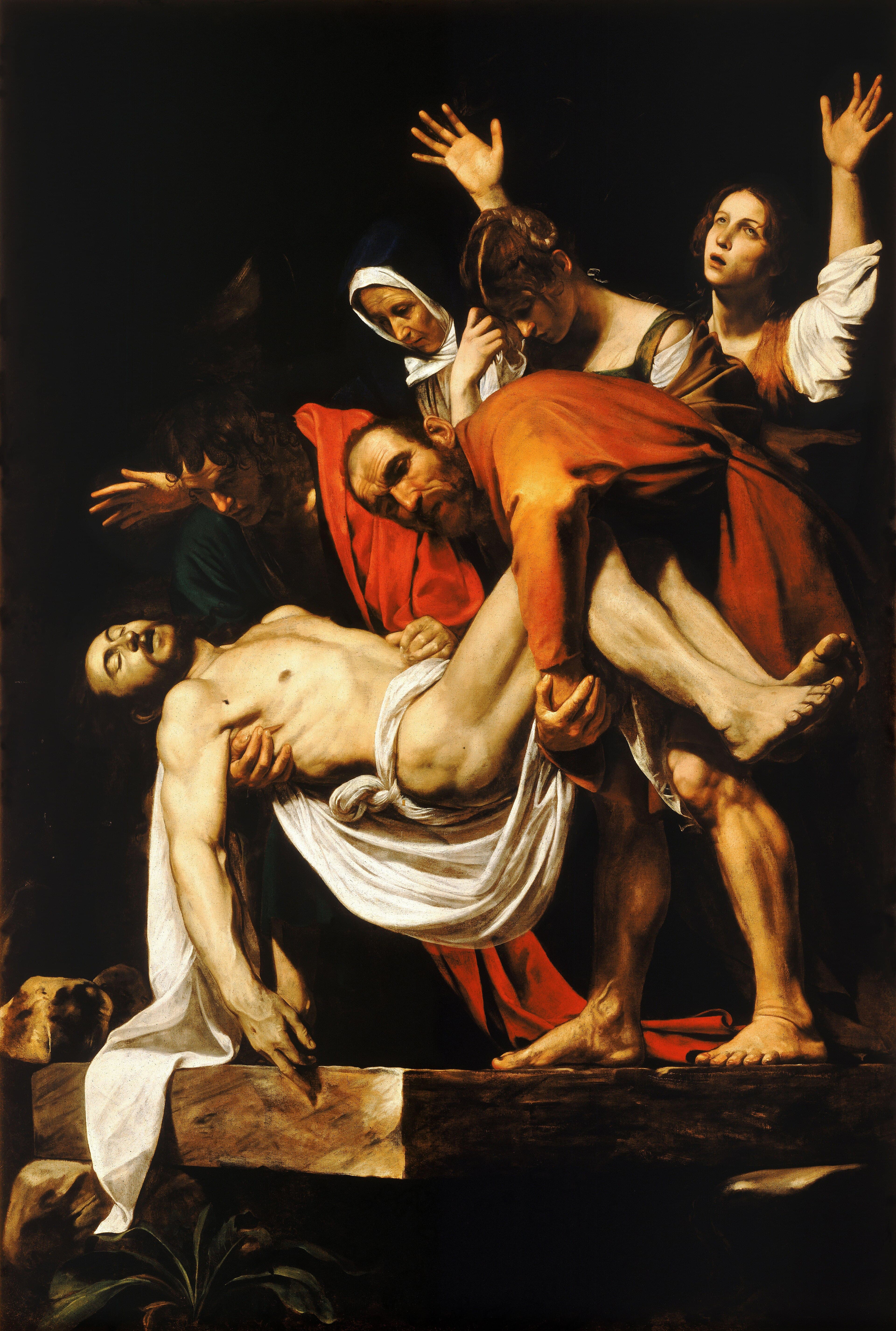 Two men lower the pale dead body of Christ onto a jutting stone slab as three women grieve, one raising her arms — Caravaggio, The Entombment of Christ, 1603–04