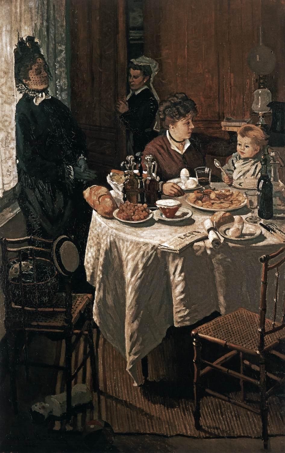 A woman and small child sit at a round table laid for lunch, a maid at the door and a visitor by the window — Claude Monet, The Lunch, 1868