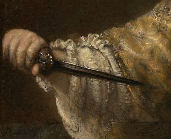 A hand grips a short dagger against a gold brocade gown and a white ruffled chemise — detail of Rembrandt, Lucretia, 1664