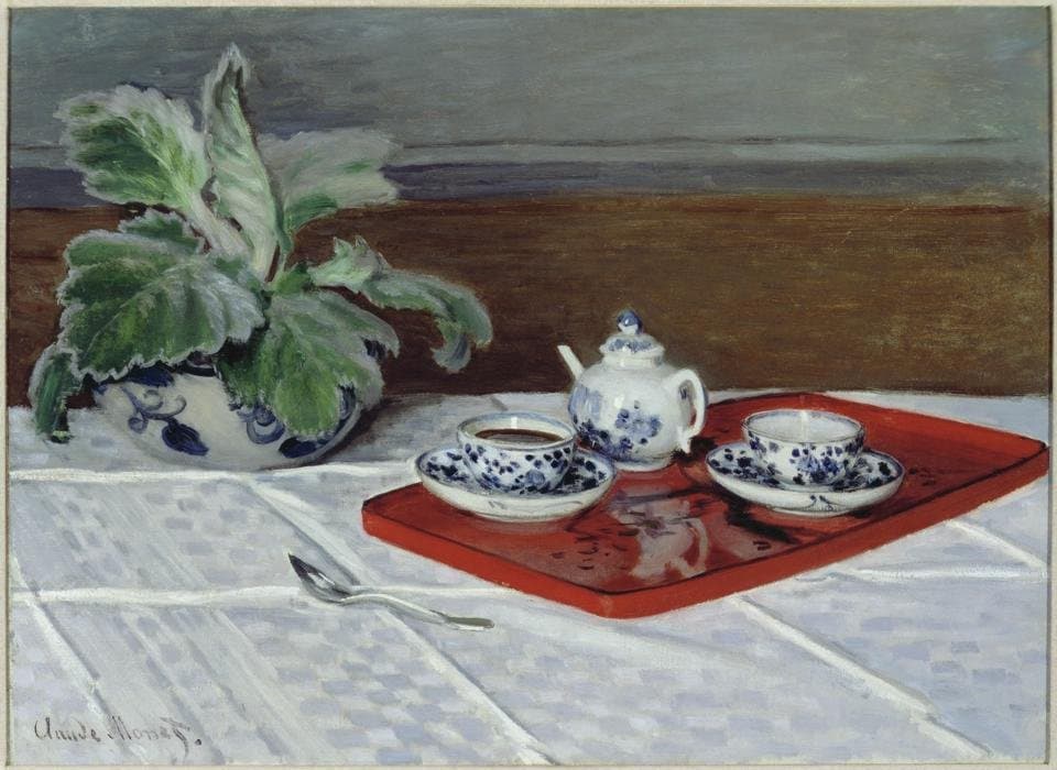 A blue-and-white teapot and two cups sit on a red lacquer tray beside a potted plant on a white checked tablecloth — Claude Monet, The Tea Service, 1872