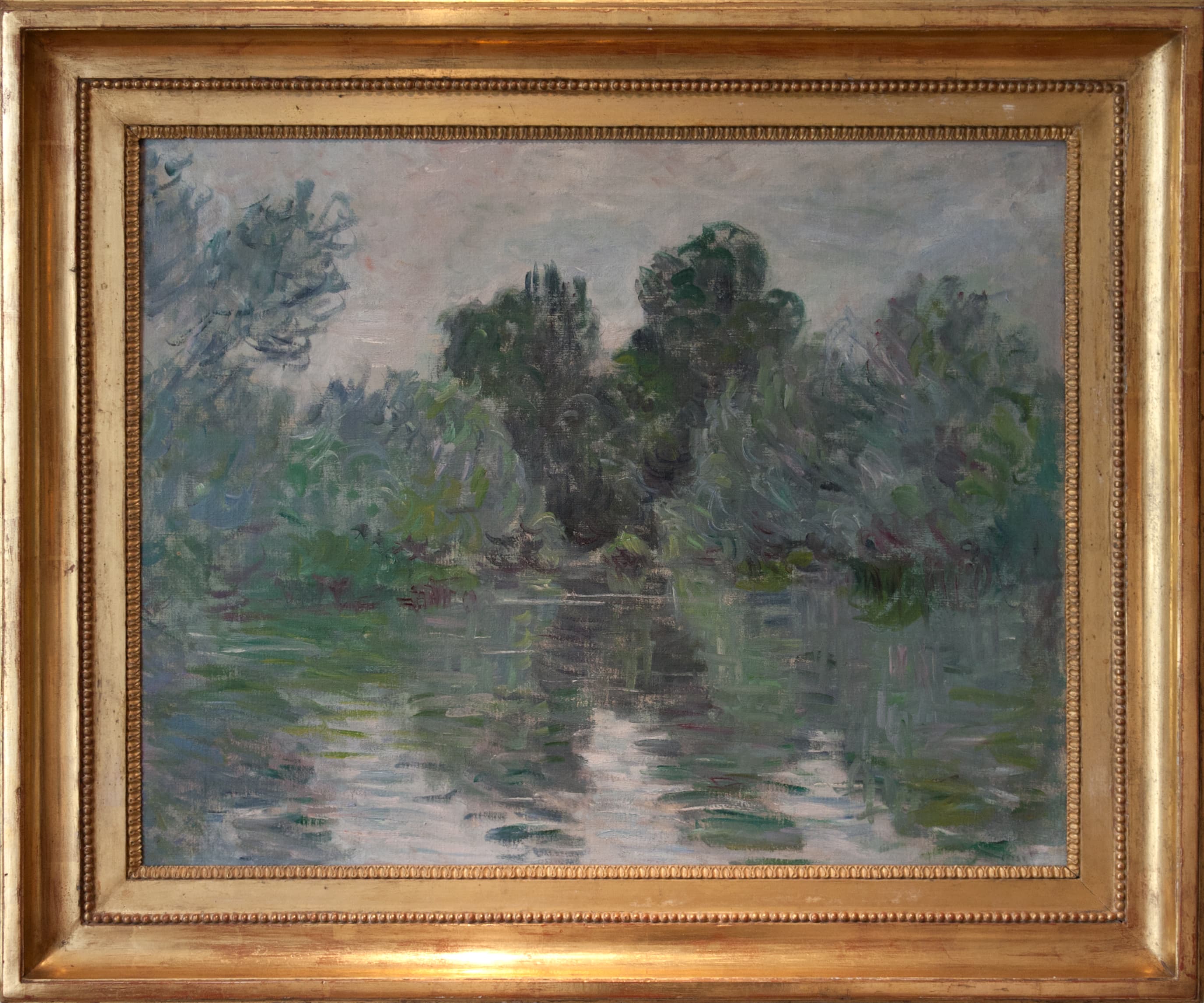 Tall dark trees on a wooded island reflected in a calm silvery channel under a heavy gray sky — Claude Monet, Un bras de Seine près de Vétheuil, 1878