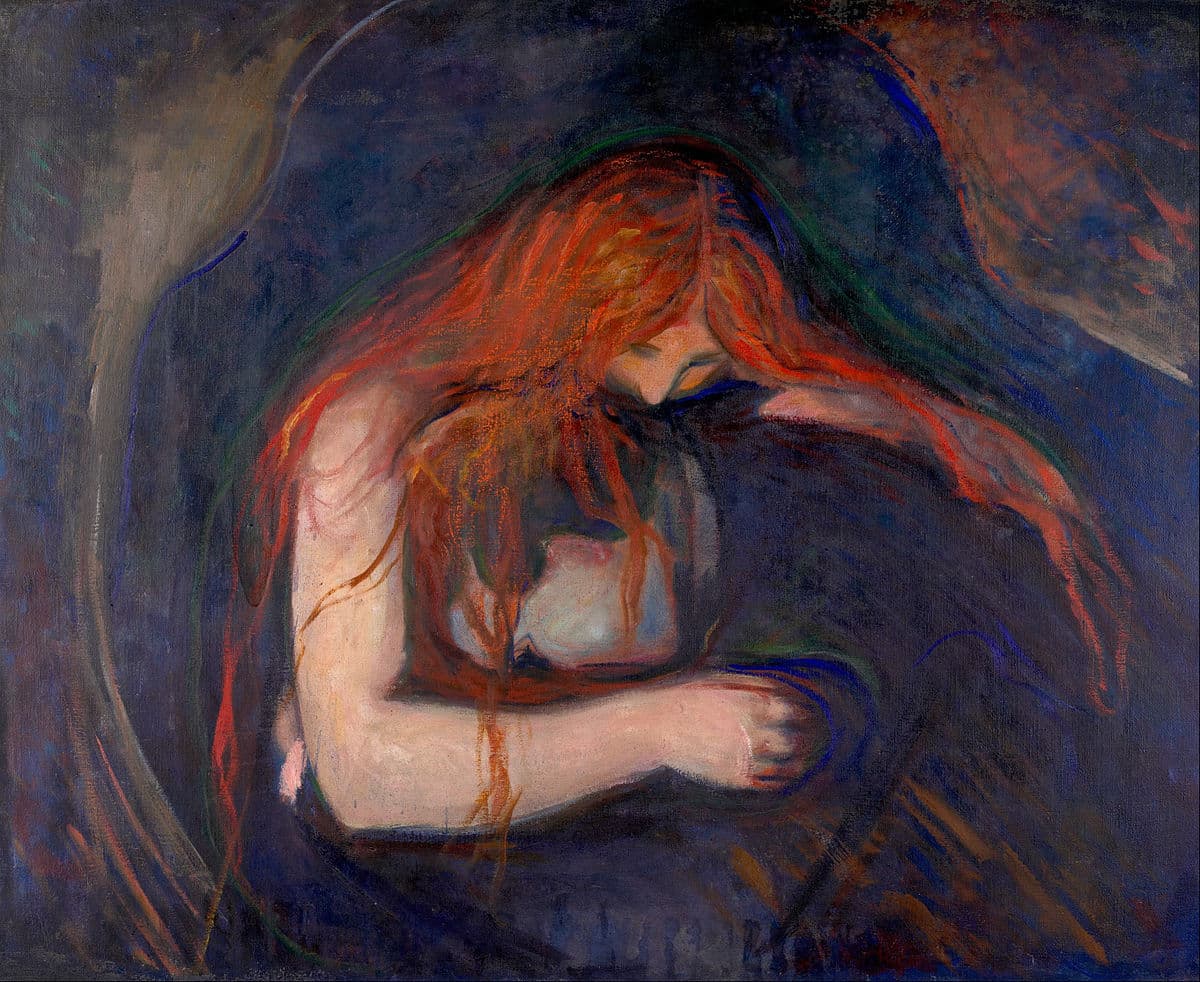 A red-haired woman bends over a kneeling man and presses her face to his neck, her hair falling over him against a dark blue background — Edvard Munch, Vampire (Love and Pain), 1895