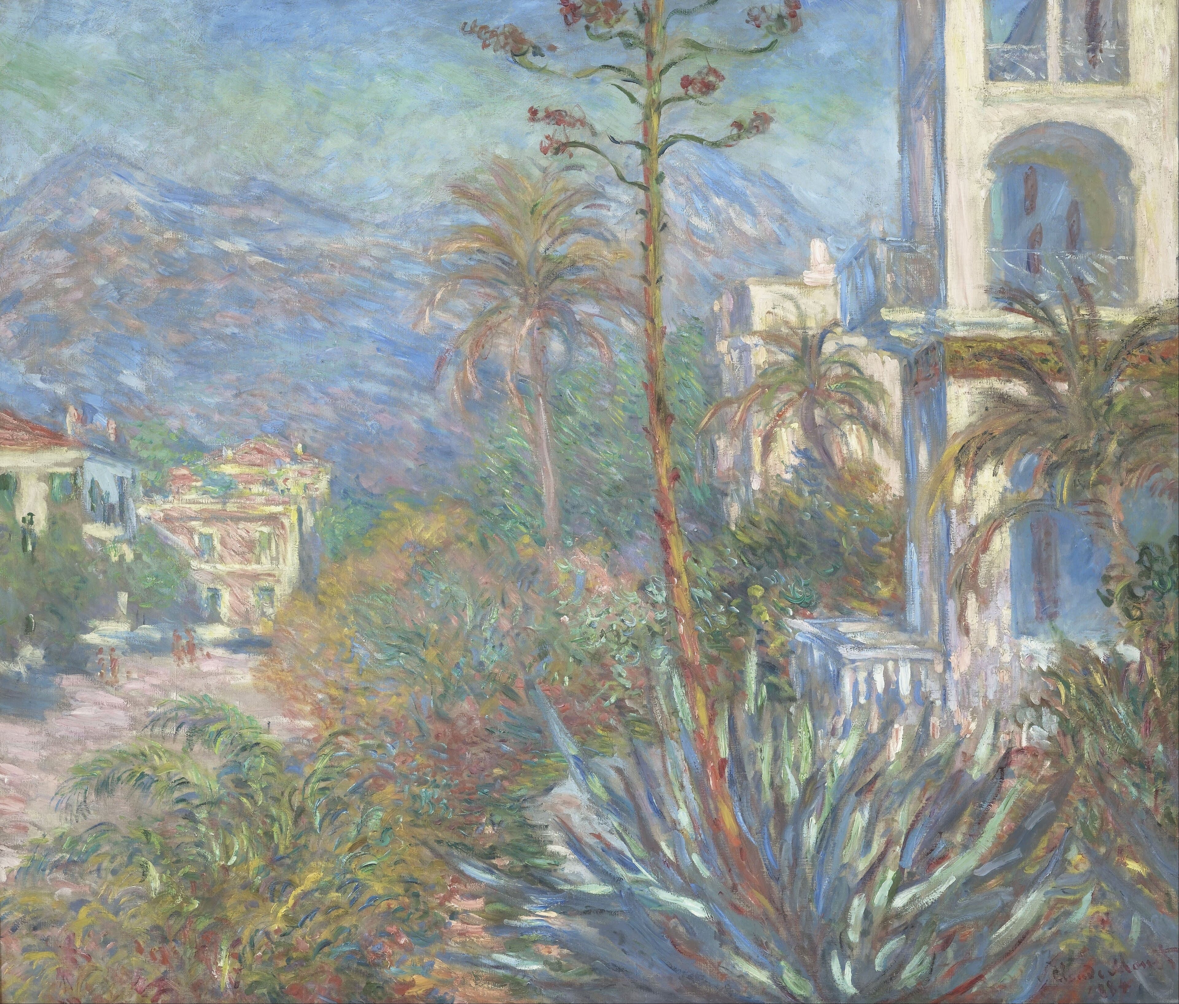 A tall flowering agave stalk rises among palms before white villas with a sunlit tower, blue mountains behind — Claude Monet, Villas at Bordighera, 1884