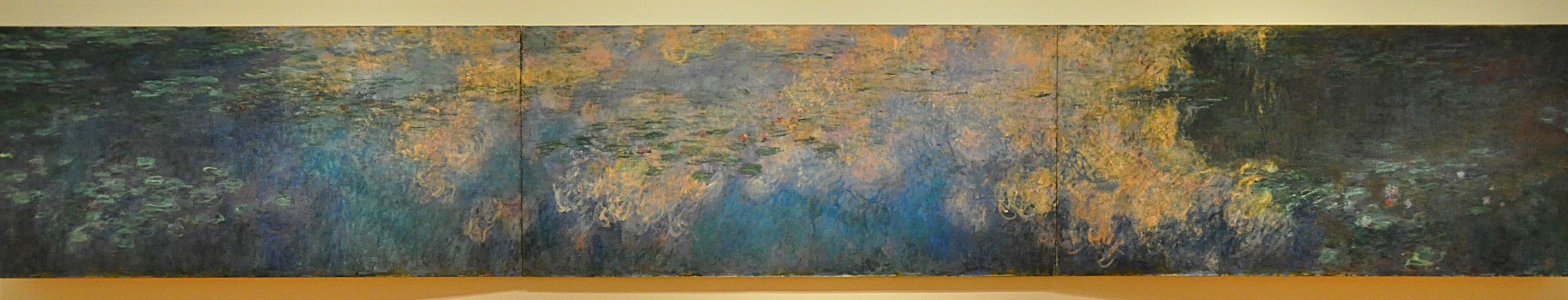 A wide, three-panel view of a pond surface with blue water, floating green lily pads and a band of reflected golden clouds — Claude Monet, Water Lilies, 1914–26