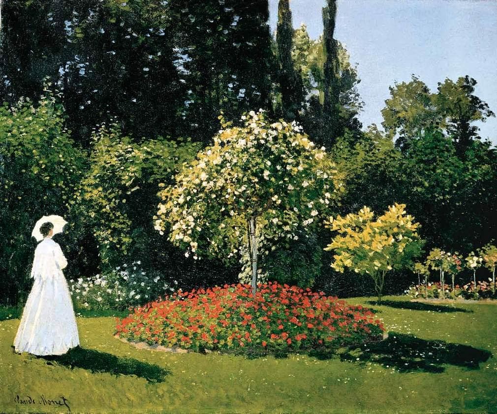 A woman in a long white dress with a white parasol stands at the edge of a sunny lawn with a round bed of red geraniums and a blossoming tree — Claude Monet, Woman in the Garden, 1867
